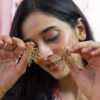 Gold Floral Studs - Image 3